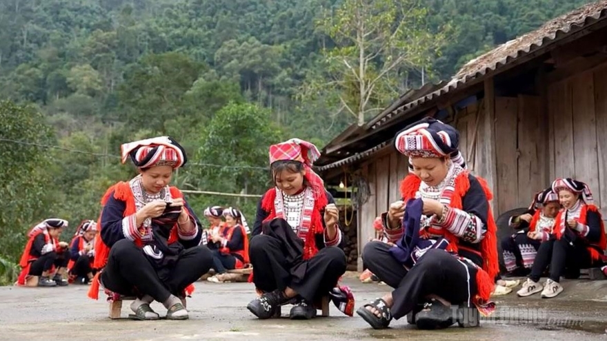Embroidered ceremonial costumes of the Red Dao people